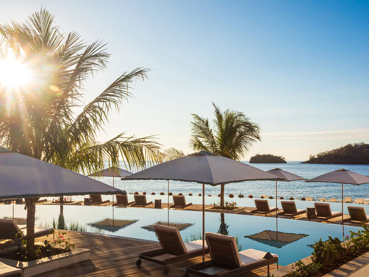 Sandals Saint Vincent Parisol Pool Sunsest 3I6A7846 c Sandals Resorts 1